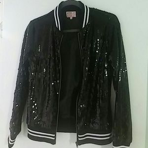 Black Sequin baseball jacket. White strip cuffs